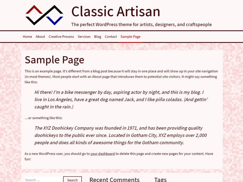 Classic Artisan theme screenshot showing bold typography in a canvas on pink-to-red colors.